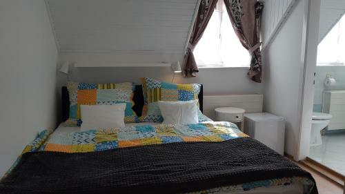 Hostal K�k Hull�m Vend�gh�z