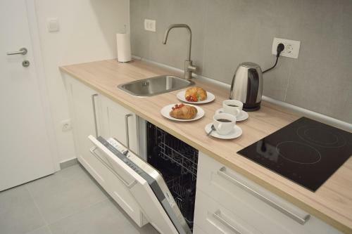 Apartamentos Anastasia Suites Downtown
