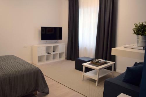 Apartamentos Anastasia Suites Downtown