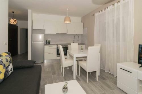 Apartmani Marinovi?