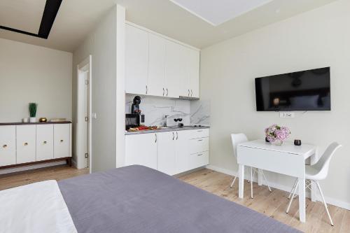 Apartamento Przice Gardens With Heated Pool