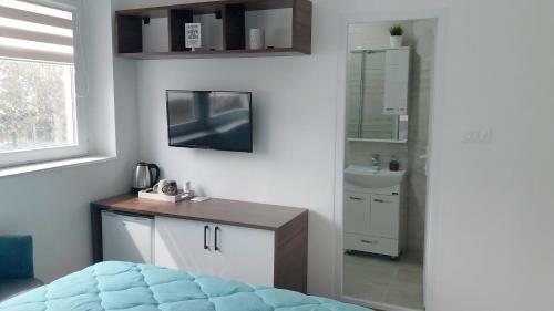 Hostal The House Apartments & Guest Rooms