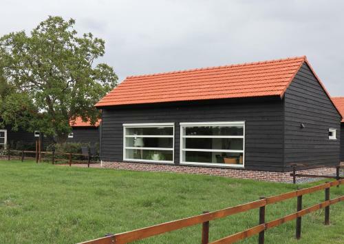 Met de Kippen Op Stok - Vakantiehuisjes