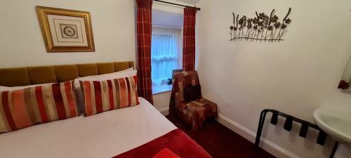 Hostal Holly Cottages