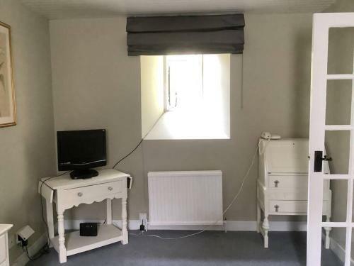 Apartamento Gardener's Cottage