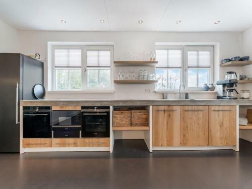 Luxury Holiday Home In Den Burg With A Whirlpool