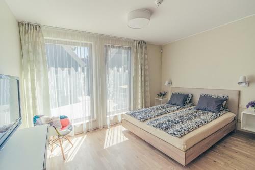 Nidos Apartamentai Taikos G.41