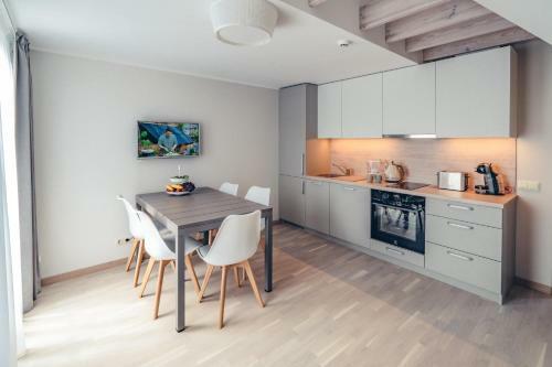 Nidos Apartamentai Taikos G.41