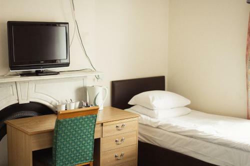 Hostal Abbey Lodge Hotel