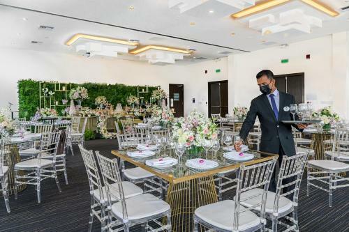 River Garden Hotel + Suites