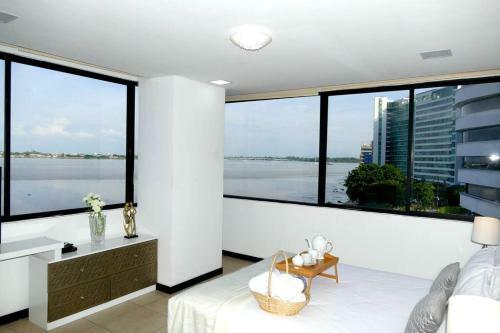 Apartamento Ecu Suites Front View Of River Exclusive Santa Ana