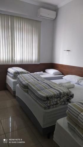 Quarto Familiar Com Ar,frigobar,wi Fi, Garagem