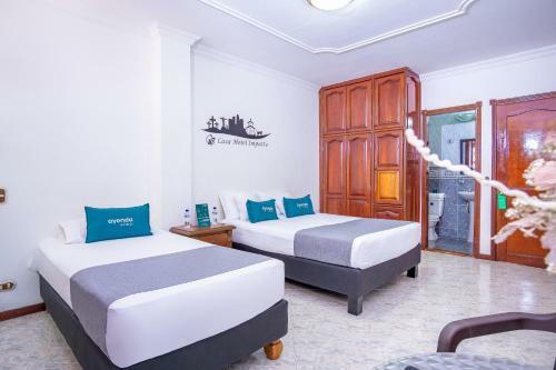 Hostal Ayenda Casa Impacto