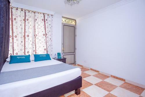Hostal Ayenda Casa Impacto