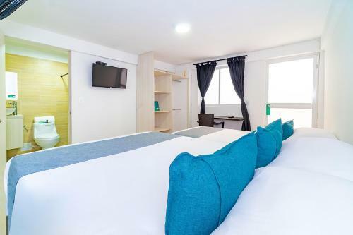 Hotel Ayenda Casa Impacto 66