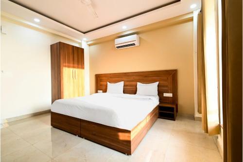 Fabhotel Holy House