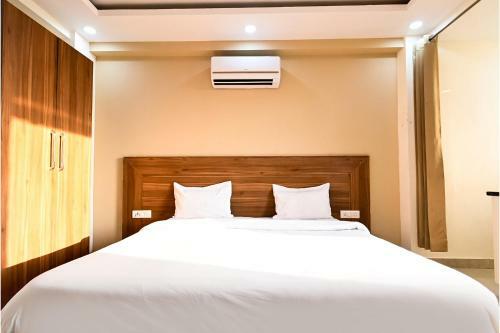 Fabhotel Holy House