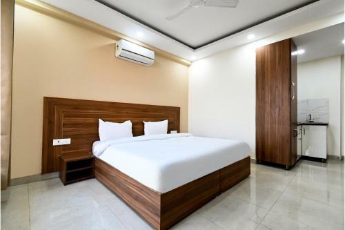 Fabhotel Holy House