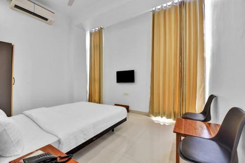 Collection O 74619 Gatsby Hotel