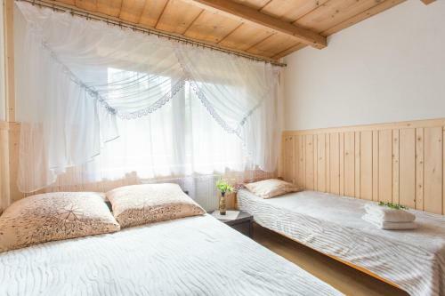 Apartamento Szarotka