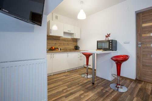 Tybet Domki I Apartamenty
