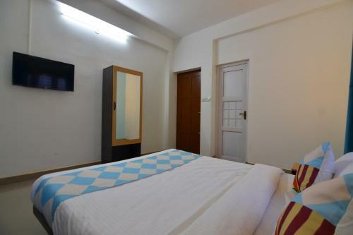 Hostal Oyo 79000 Grace Apartment