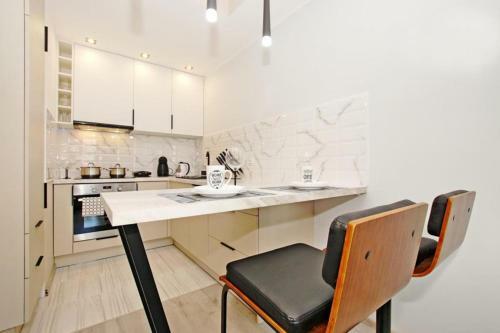 Flatbook - City Center Spa Apartments