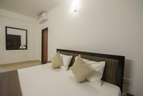 Apartamento Aashirwad Serviced Residences