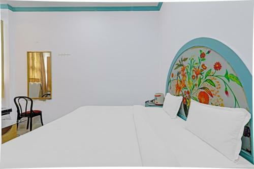 Hotel Capital O 86046 Uday Raj Lawn