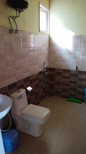 Wood Cottage Homestay
