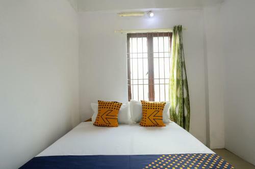 Hotel Spot On 49577 Thozhupaadan Residency