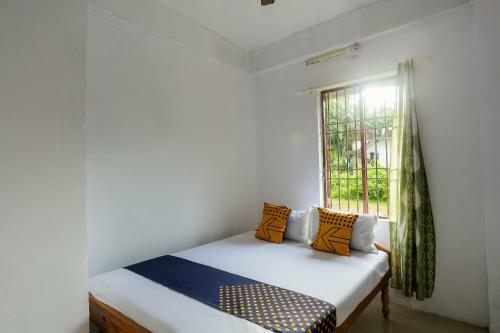 Hotel Spot On 49577 Thozhupaadan Residency