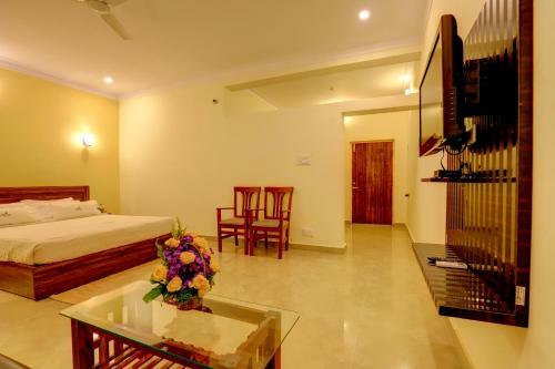 Hotel Ezzenza Royal Garden Brindavan Resort
