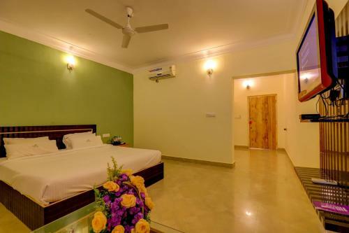 Hotel Ezzenza Royal Garden Brindavan Resort