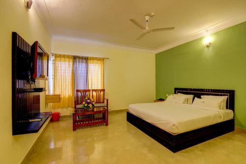 Hotel Ezzenza Royal Garden Brindavan Resort
