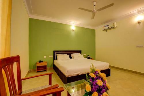 Hotel Ezzenza Royal Garden Brindavan Resort