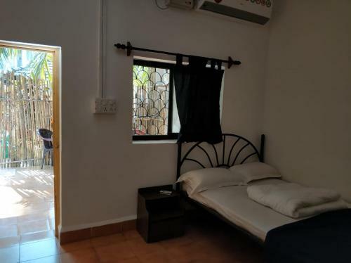 Hostal Palm Breeze Suites