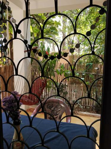 Hostal Palm Breeze Suites