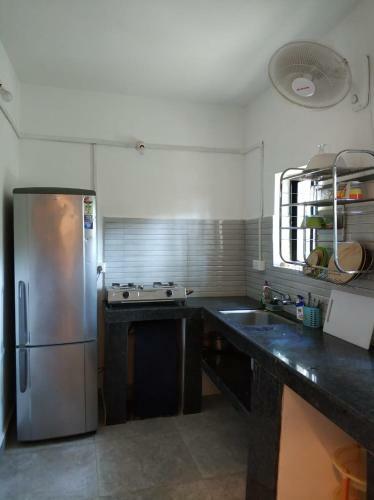 Hostal Palm Breeze Suites