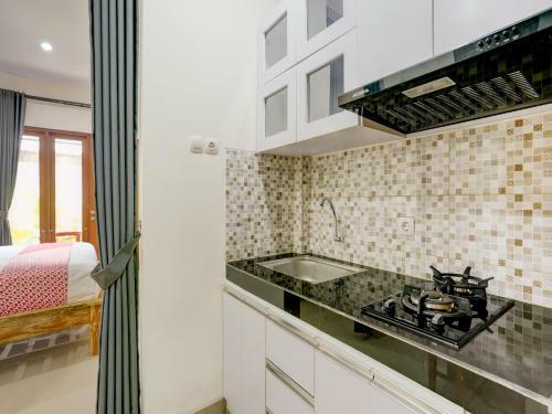 Hotel Oyo 90232 March 67 Stay