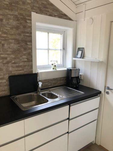 Lodge H�llestrand Cottage -sillen