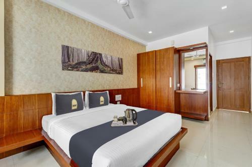 Hotel Townhouse Oak Sharoz Residency