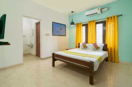 Hostal Oyo 79724 Tharayil Apartments