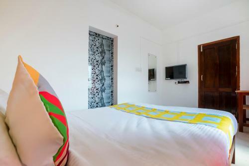 Hostal Oyo 79724 Tharayil Apartments