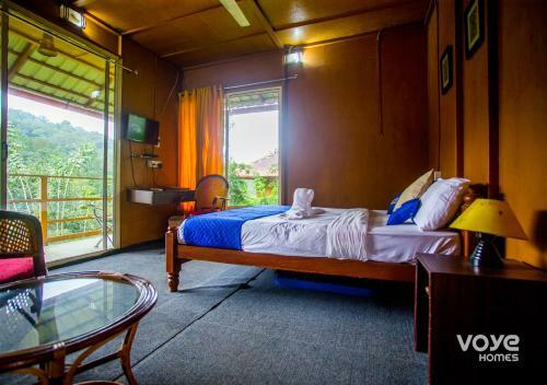 Hotel Voye Homes Oxyfarm Resorts