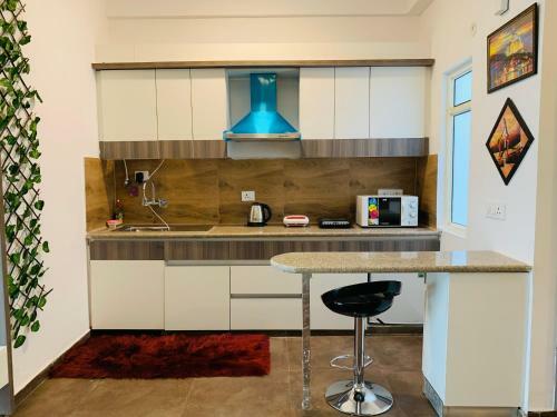 Apartamento The Dunnock Square Near India Expo Mart