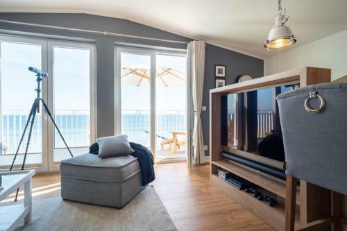 Apartamento Haus-meerblick-villa-wohnung-meeresloge