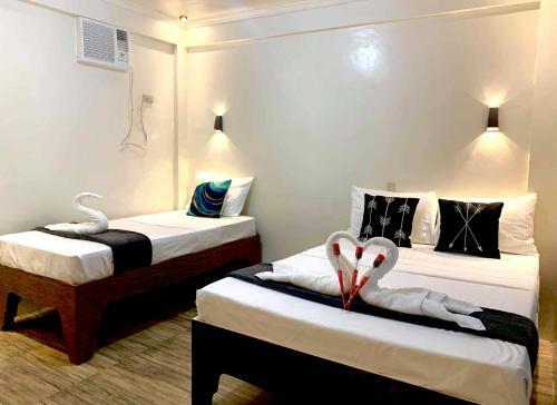 Hotel Pamanilao And Padoy's Dive Camp