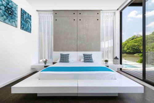 Ultramodern Riverfront Villa With Infinity Pool