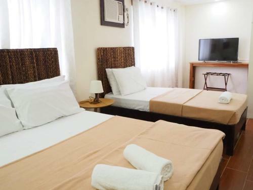 Hotel Thirdys Tourist Inn